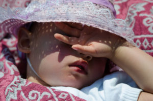 24641293 - young girl taking a nap in the sun